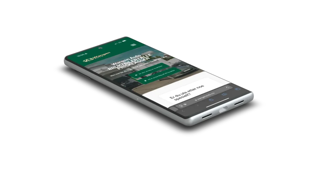 En smarttelefon viser det nye nettstedet til Wangen Auto, og viser et grønt og hvitt tema som gjenspeiler dens digitale transformasjon med et sterkt fokus på kundeservice.